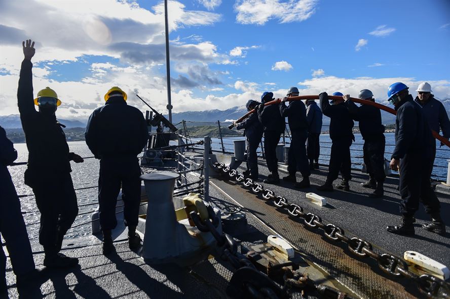 U.S. sailors aboard USS Carney clean the anchor chain after departing Souda Bay, Greece, Jan. 20, 2016.
