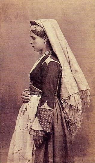 A Cretan Woman of Candia in native costume. Crete Greece. Date Late 19th-early 20th Century