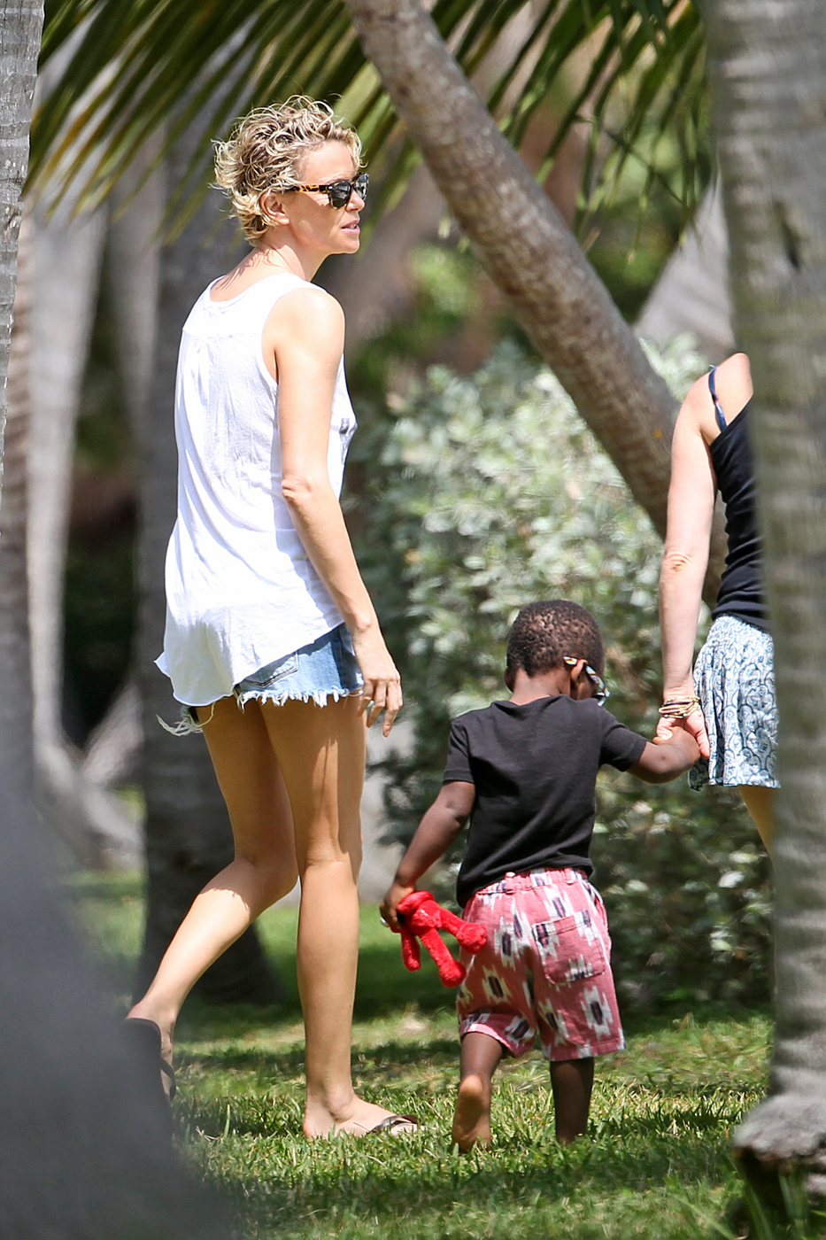 Charlize Theron gets a visit from son Jackson while on a photo shoot in Miami Beach
