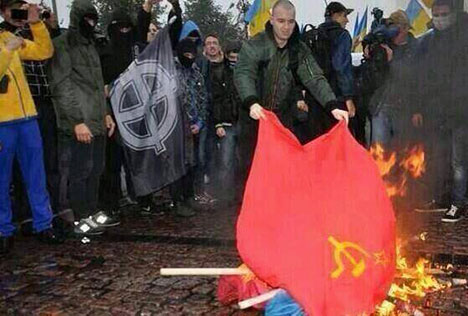 Ukrainian nazis burn flag